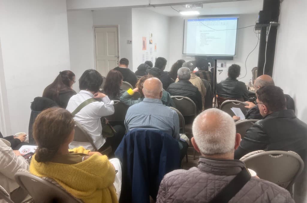 Community members attending an information session at Unity of Migrant Workers