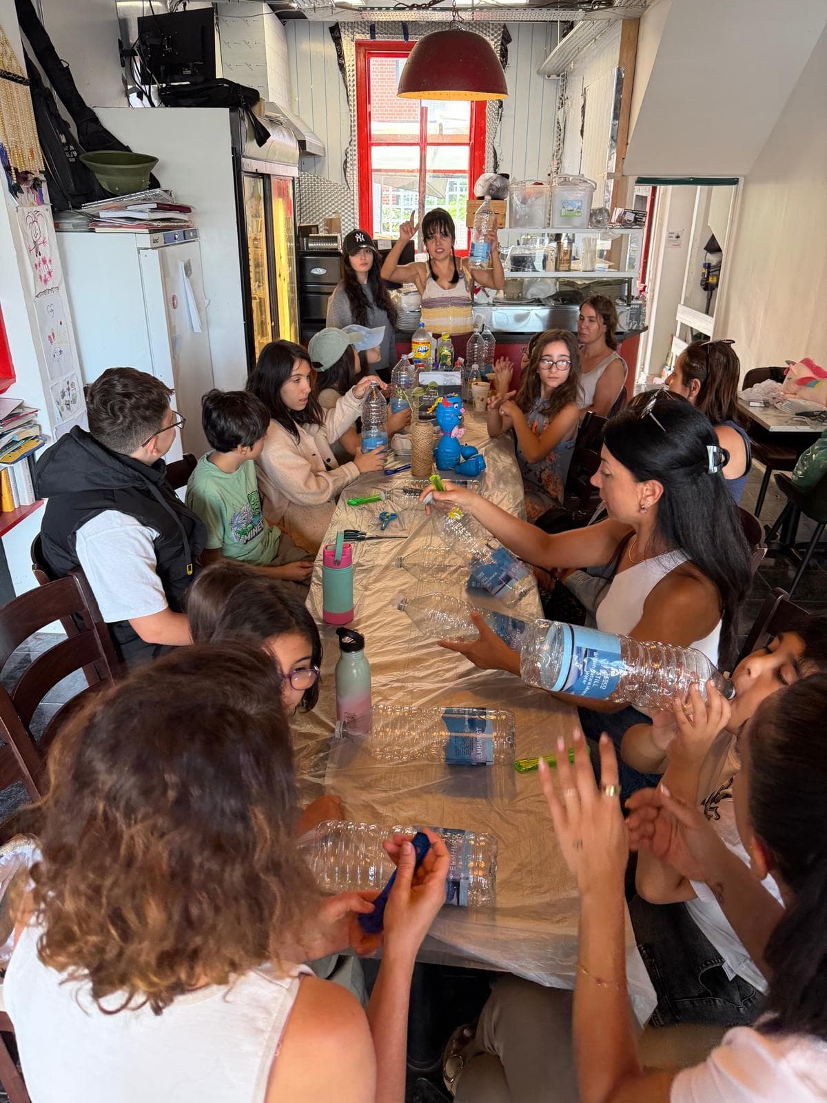 Children and Mothers Turned Recycled Materials into Toys